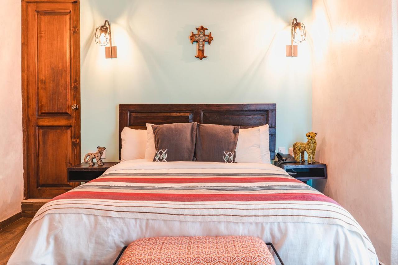 Yox Hotel Boutique Сан-Кристобаль-де-Ла-Касас Экстерьер фото A bedroom at the hotel